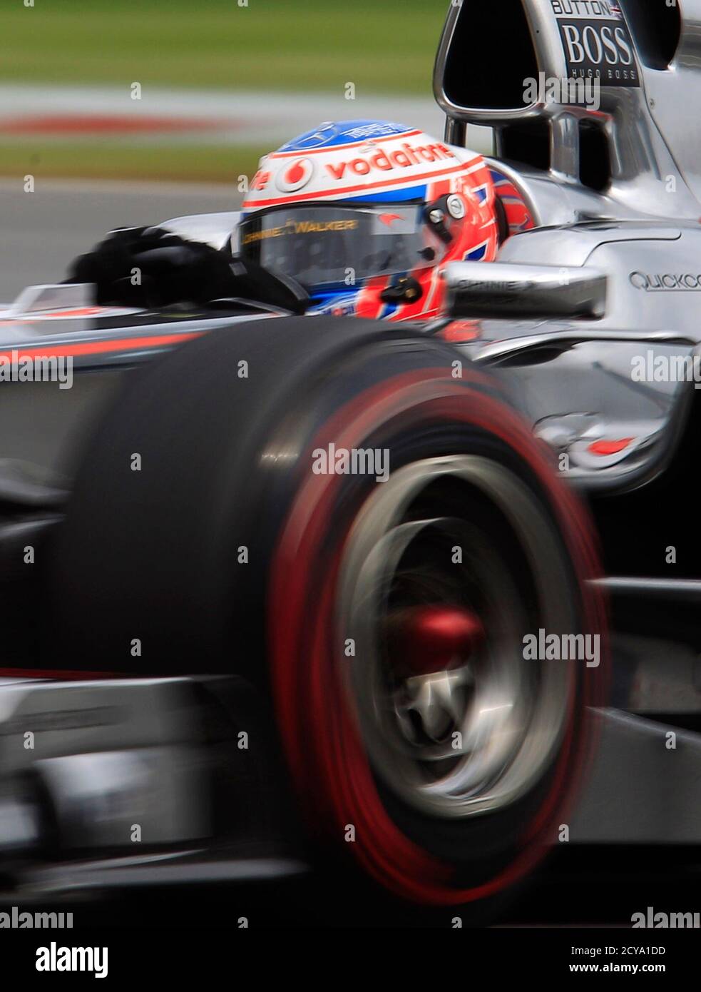 McLaren Formula One driver Jenson Button of Britain drives during the third practice session of the Canadian F1 Grand Prix at the Circuit Gilles Villeneuve in Montreal June 11, 2011.  REUTERS/Chris Wattie (CANADA  - Tags: SPORT MOTOR RACING) Stock Photo