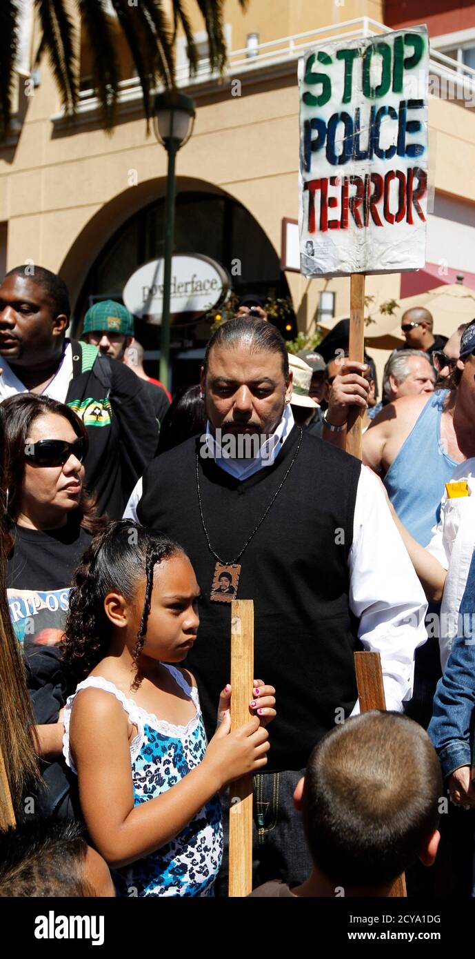 Tatiana Grant 2nd L The Seven Year Old Daughter Of Oscar Grant Participates In A Protest Against The Upcoming Release Of Former Transit Officer Johannes Mehserle From A Los Angeles Prison In Oakland California