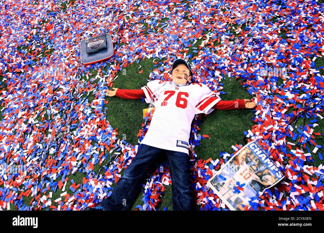 Dylan Snee, 8, son of New York Giants player Chris Snee and head coach Tom  Coughlin's grandson plays in the confetti after the New York Giants  defeated the New England Patriots in