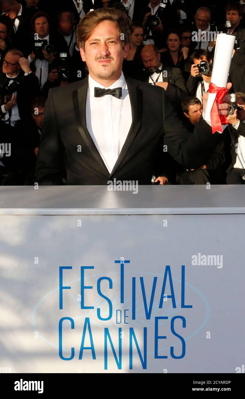 Director Simon Mesa Soto, Short film Palme d'Or award winner, poses during  a photocall at the closing ceremony of the 67th Cannes Film Festival in  Cannes May 24, 2014. REUTERS/Regis Duvignau (FRANCE -
