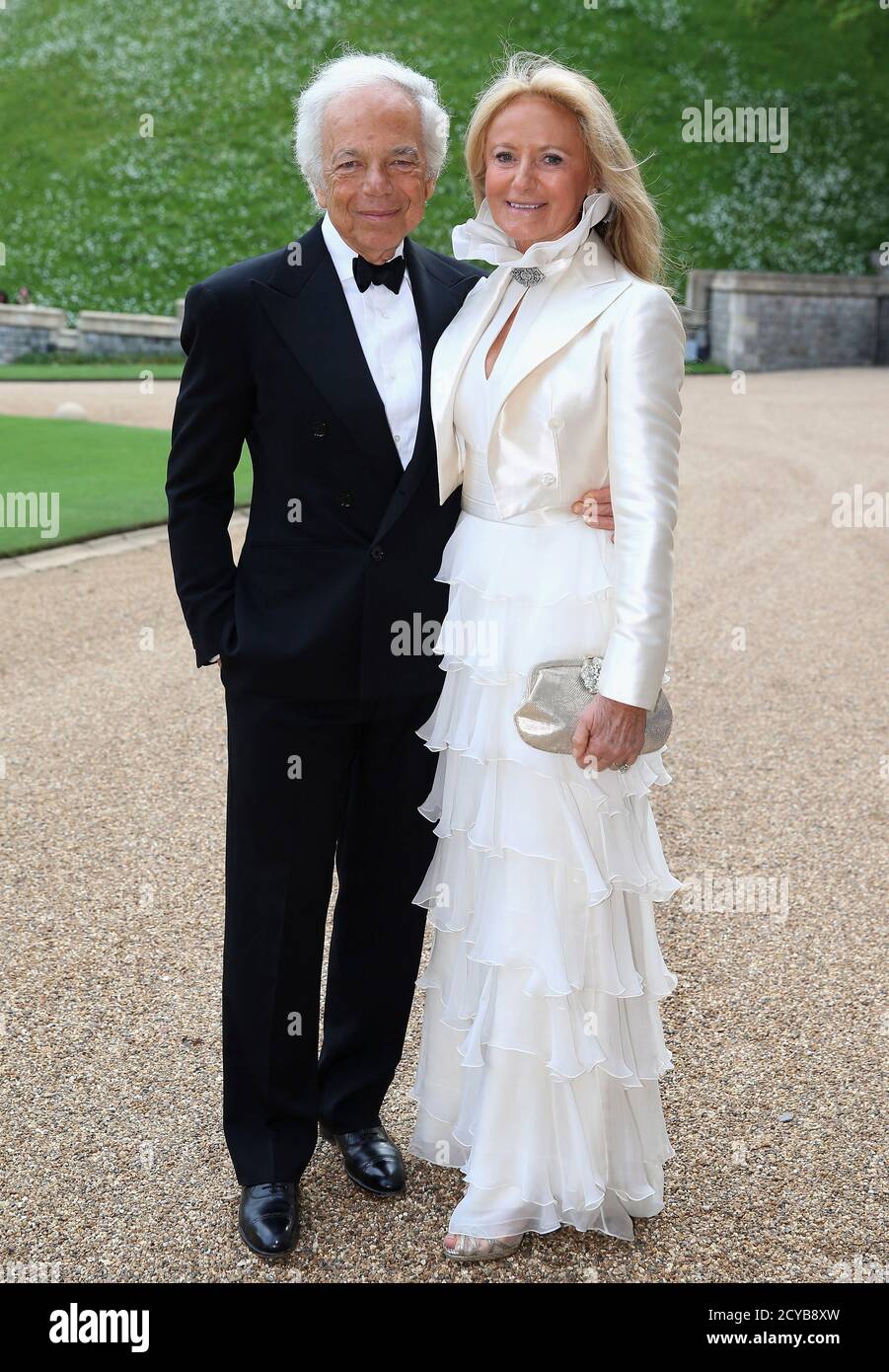 Ralph Lauren and Ricky Anne Loew-Beer arrive for a dinner to celebrate the  work of The Royal Marsden hosted by Britain Prince William at Windsor  Castle, in Windsor, May 13, 2014. REUTERS/Chris