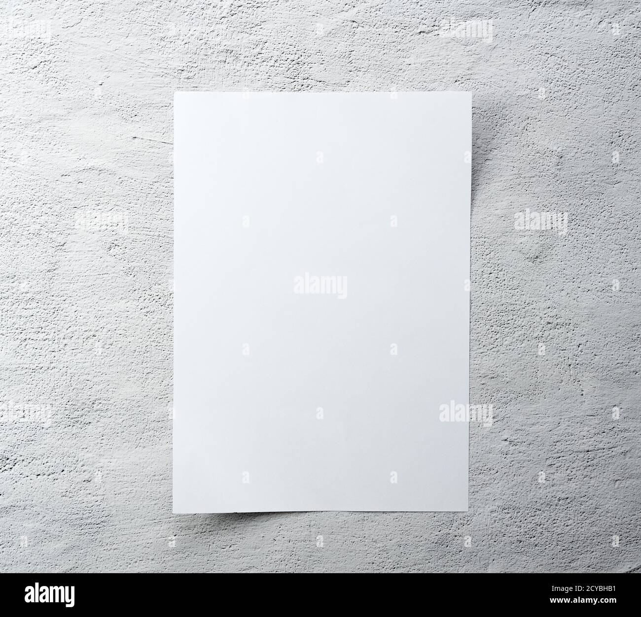 White paper on a concrete background. Stock Photo