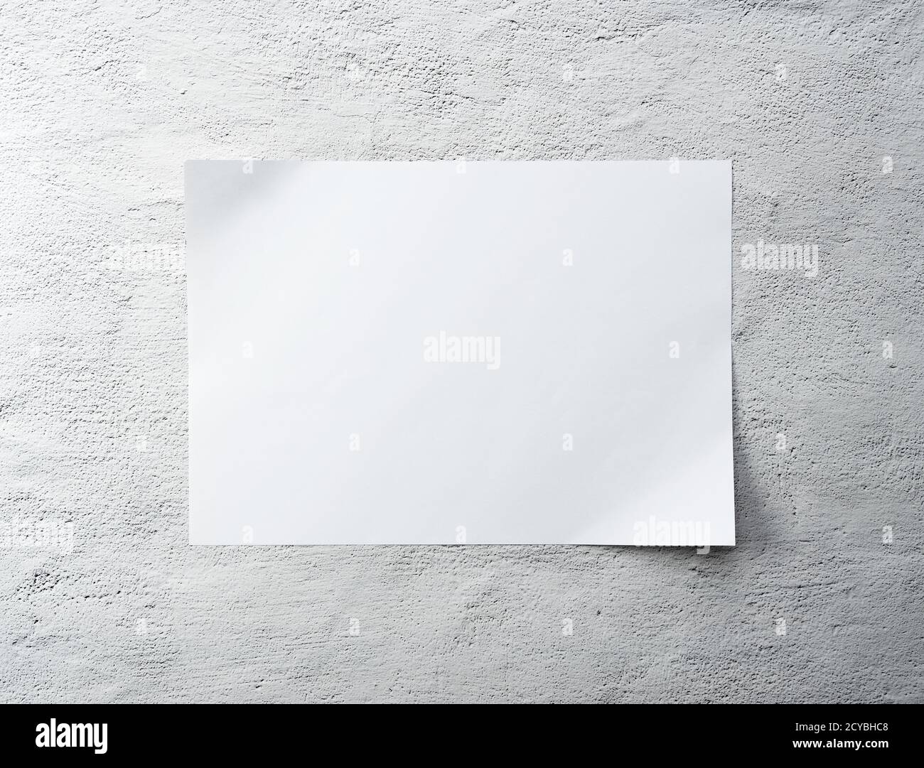 White paper on a concrete background. Stock Photo