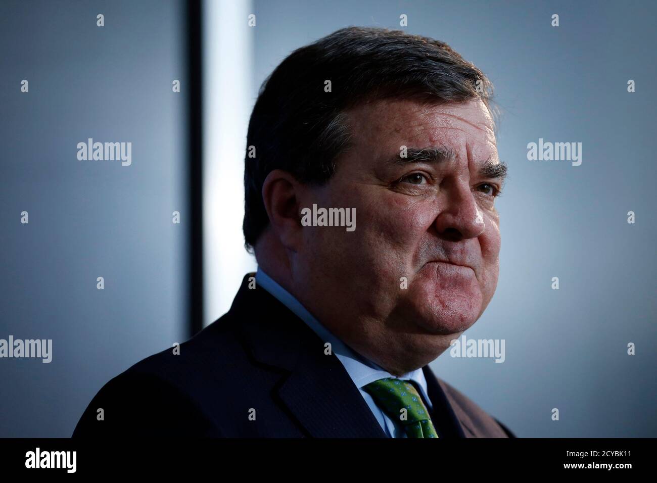 Canada's Finance Minister Jim Flaherty listens to a question during a news conference in Ottawa March 1, 2013. The slowing Canadian economy means the government will have lower revenues than it initially forecast as it draws up the next budget, which is due soon, Flaherty said on Friday. REUTERS/Chris Wattie (CANADA - Tags: POLITICS BUSINESS) Stock Photo