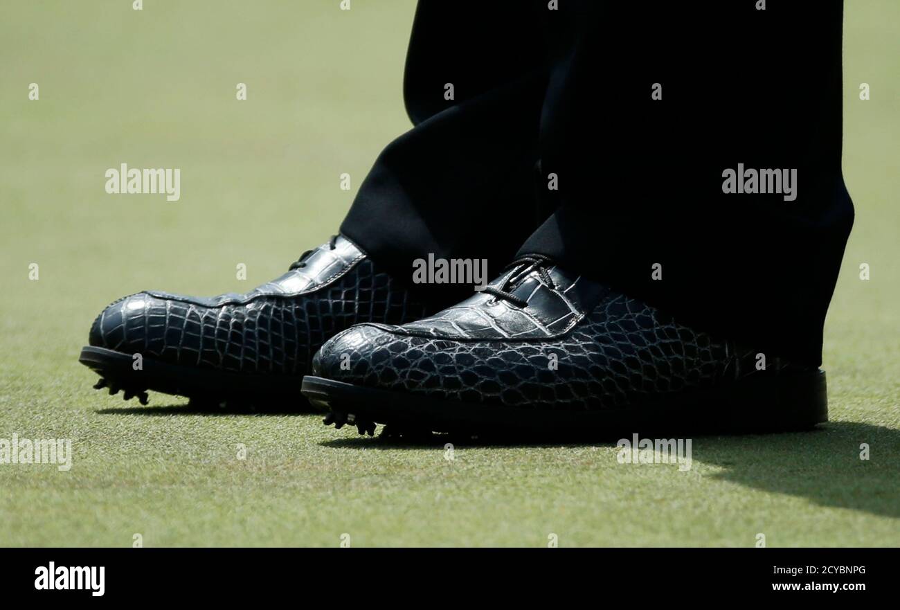 . golfer Phil Mickelson wears patterned golf shoes during the second  round of the Masters golf tournament at the Augusta National Golf Club in  Augusta, Georgia April 11, 2014. REUTERS/Mike Blake (UNITED