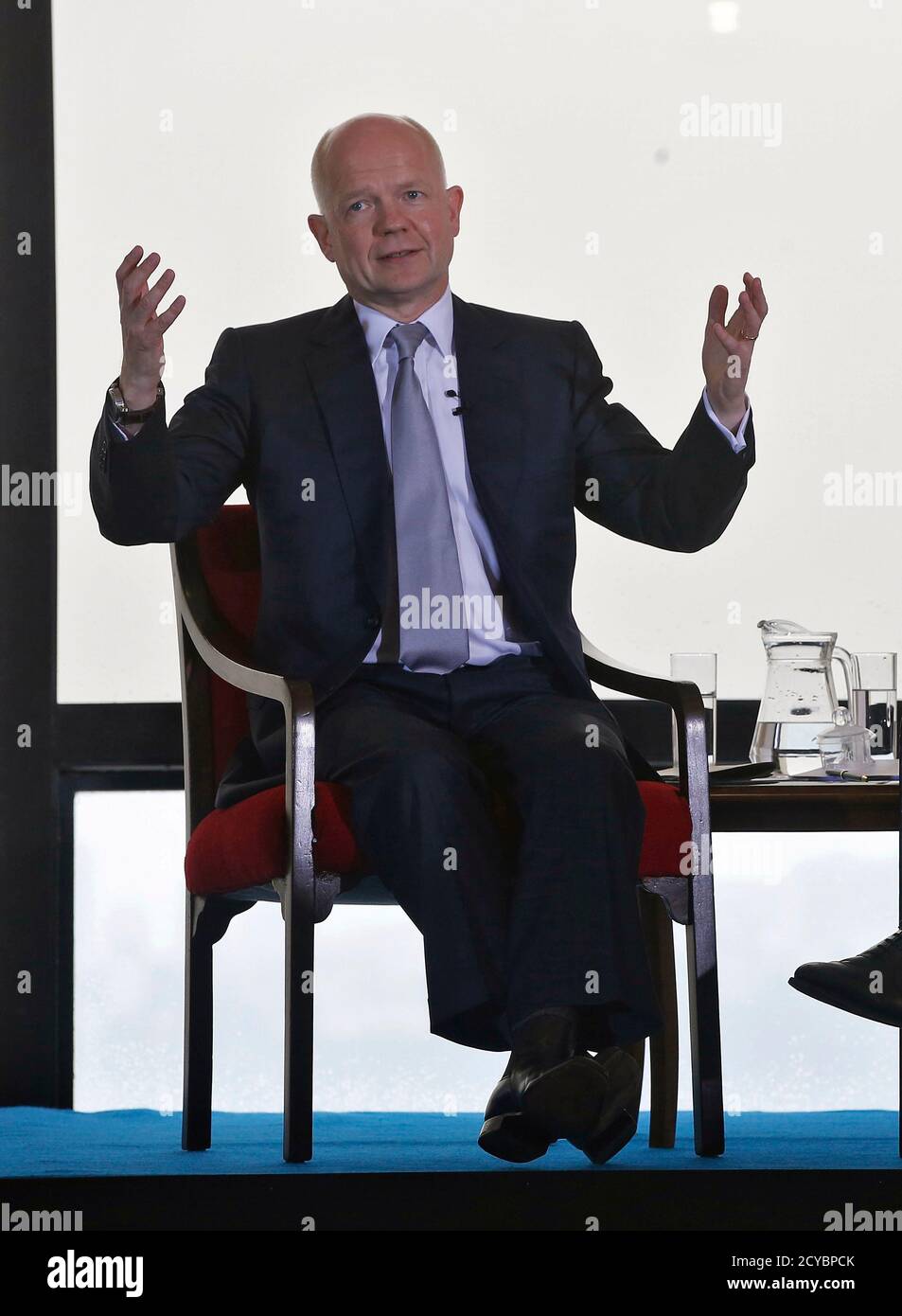 Britain's Foreign Secretary William Hague speaks during a news conference in Mumbai July 7, 2014. Two of Britain's most senior government ministers begin a two-day visit to India on Monday hoping to open up opportunities in the defence and infrastructure sectors, the first such trip since Prime Minister Narendra Modi's May election win. REUTERS/Shailesh Andrade (INDIA - Tags: POLITICS BUSINESS) Stock Photo