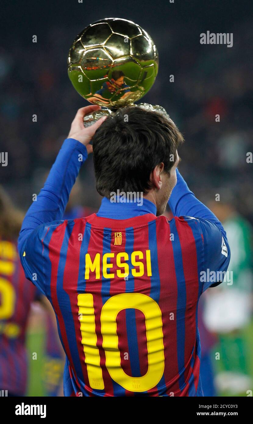 Barcelona\'s player Lionel Messi of Argentina shows his FIFA Ballon ...