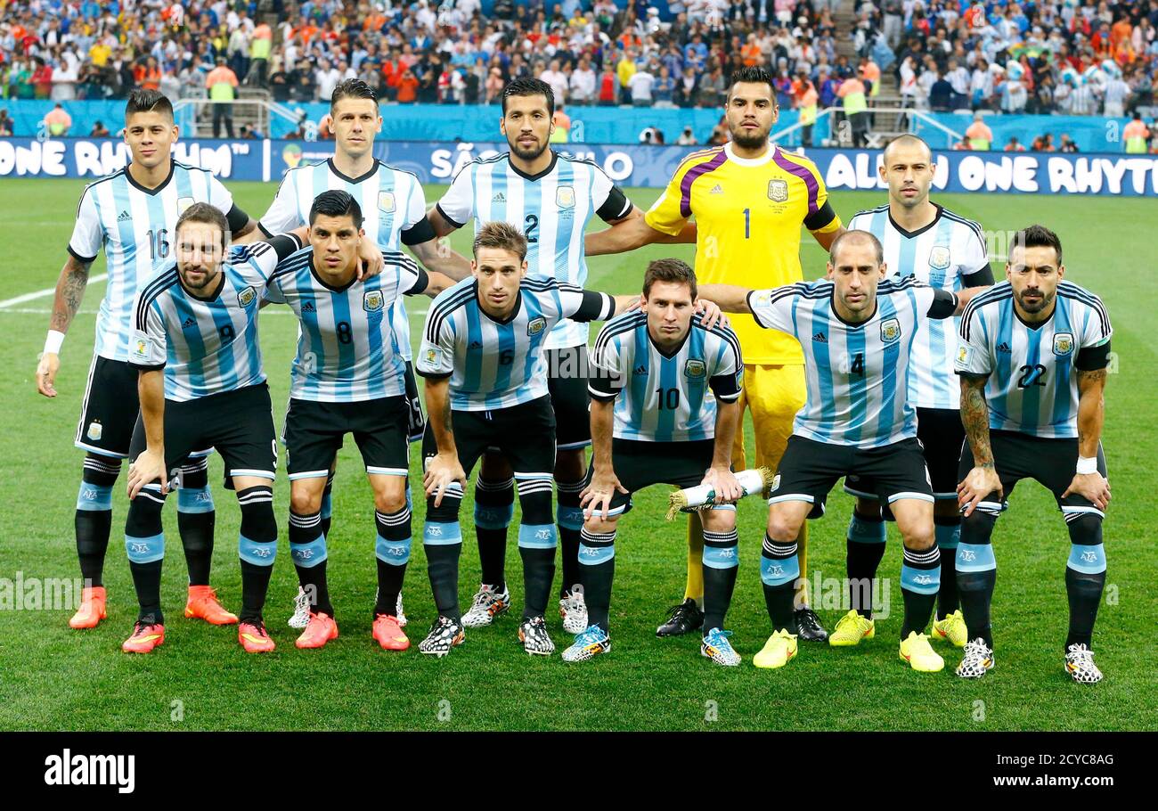 Argentina's soccer players pose for a team photo before kickoff during  their 2014 World Cup semi-finals against Netherlands at the Corinthians  arena in Sao Paulo July 9, 2014. The players are: (front