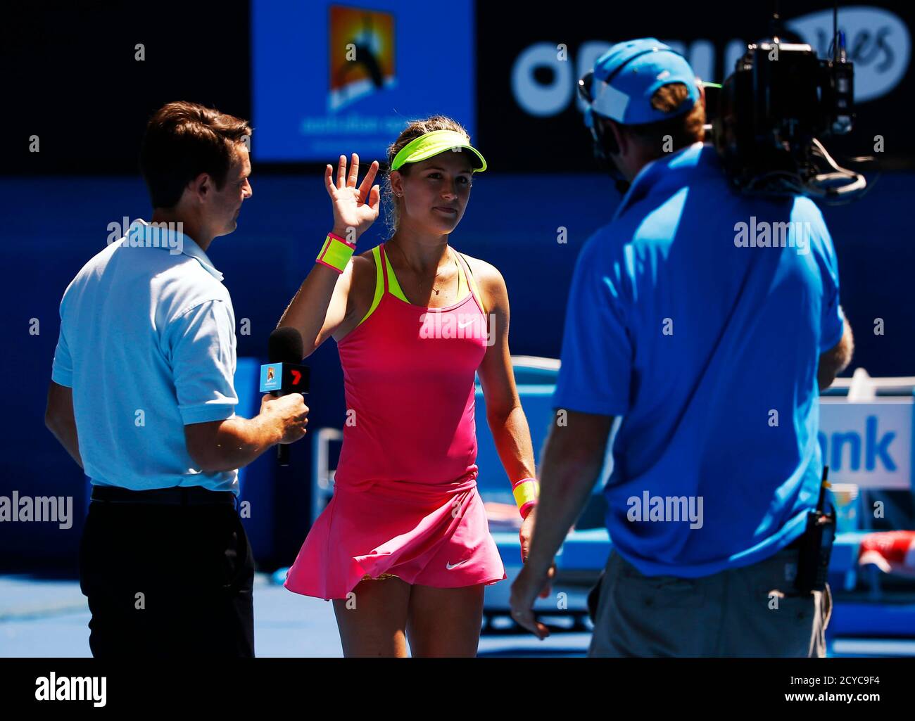 Eugenie Bouchard of Canada waves to the crowd after a television interview  on the court after defeating Caroline Garcia of France in their women's  singles third round match at the Australian Open
