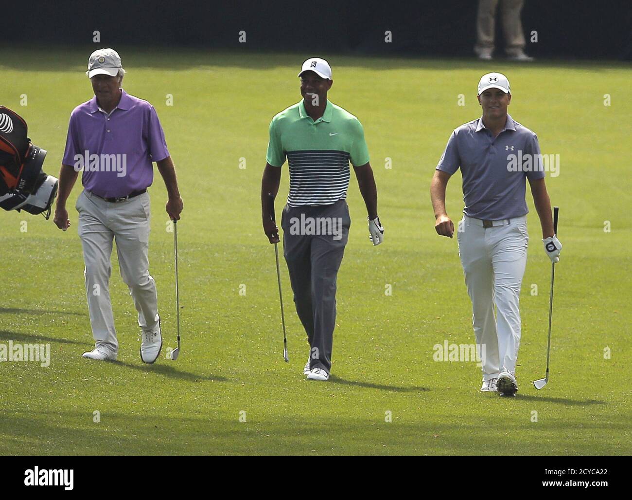 Jordan Spieth (R) walks to the 16th green with Tiger Woods (C) and Ben Crenshaw during a practice round ahead of the 2015 Masters at Augusta National Golf Course in Augusta, Georgia April 8, 2015. Spieth's sublime putting on some of the most treacherous greens in golf, which set up his Masters victory on Sunday, was underpinned by his imaginative touch, says putting maestro Ben Crenshaw. Picture taken April 8, 2015.   REUTERS/Brian Snyder Stock Photo