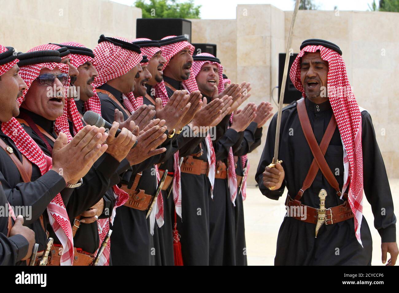 Jordanian Bedouin dancers perform during the opening of Alwan Baladna "The  colors of our country" festival in Amman May 7, 2011. The Anna Lindh  Euro-Mediterranean Foundation For The Dialogue Between Cultures and