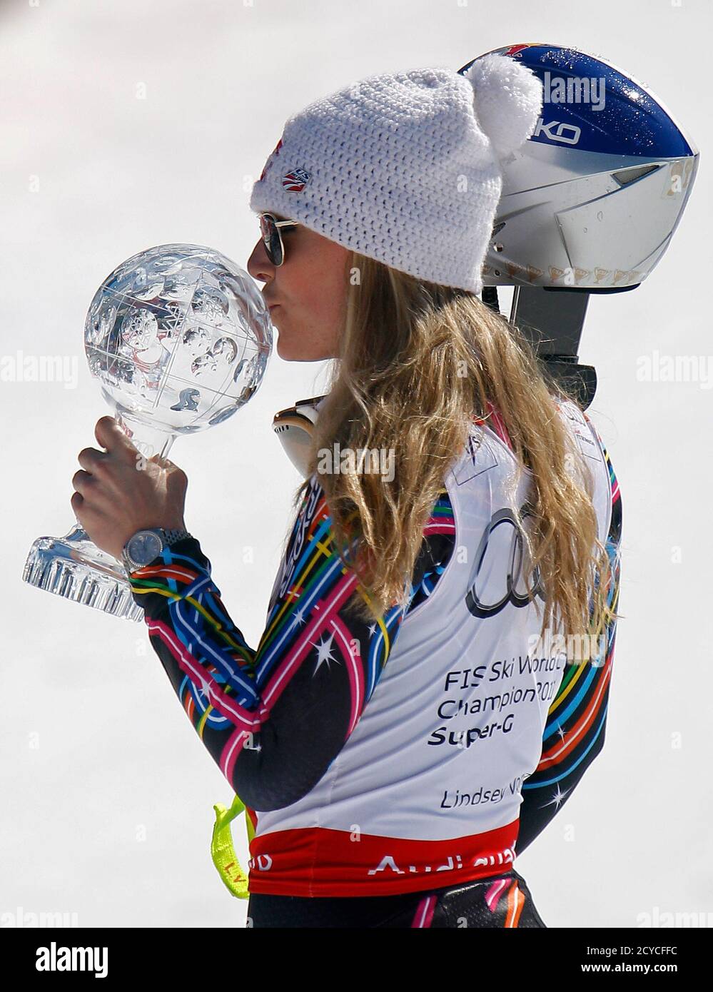 Lindsey Vonn of the U.S. kisses a trophy of the women's Super G