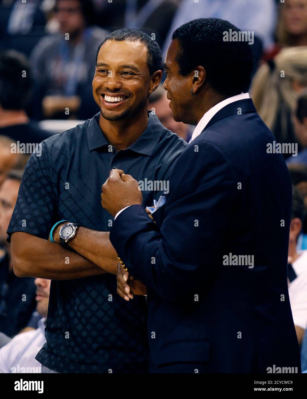Golfer Tiger Woods And Sports Announcer Ahmad Rashad Talk Before The Orlando Magic Vs Washington Wizards Nba Game In Orlando Florida October 28 2010 Reuters Kevin Kolczynski United States Tags Sport Basketball