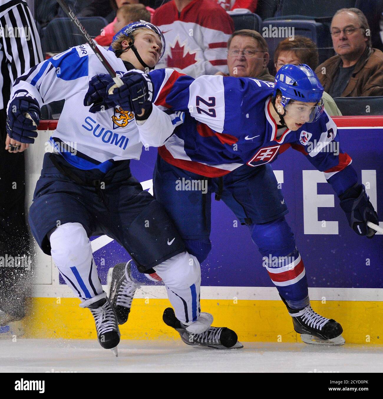 Slovakia S Milos Bubela R And Finland S Joel Armia Battle For The Puck During The Second Period Of Play At The 2012 Iihf U20 World Junior Hockey Championship In Calgary Alberta January 2