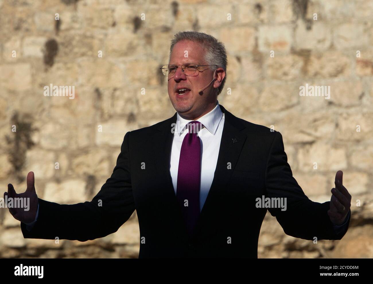 U.S. conservative broadcaster Glenn Beck gestures as he addresses the crowd during his 'Restoring Courage' rally in Jerusalem's Old City August 24, 2011. On the fringes of Jerusalem's most volatile holy sites, Beck declared his support for Israel on Wednesday at the rally showcasing fundamentalist Christian backing for the Jewish state. REUTERS/Ronen Zvulun (JERUSALEM - Tags: POLITICS RELIGION) Stock Photo