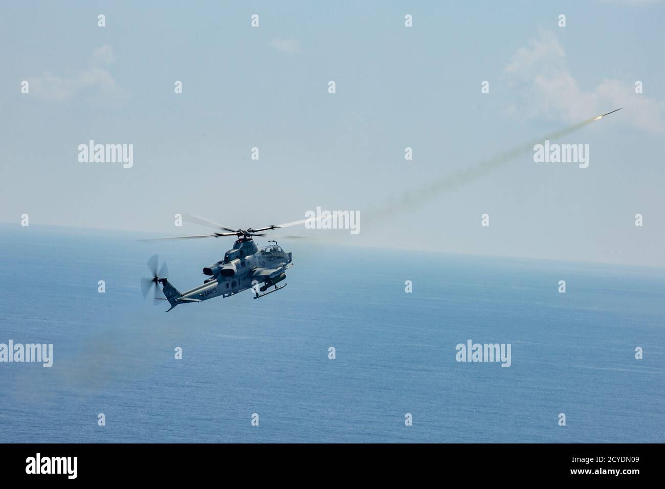 A U.S. Marine Corps AH-1Z Viper helicopter, with Marine Light Attack Helicopter Squadron (HMLA) 469, fires a training flare during a live-fire training event near Okinawa, Japan, Sept. 29, 2020. HMLA-469 conducted a live-fire exercise using Air Intercept Missiles (AIM-9 Sidewinder missiles) to improve proficiency with the weapon system. (U.S. Marine Corps photo by Cpl. Ethan M. LeBlanc) Stock Photo