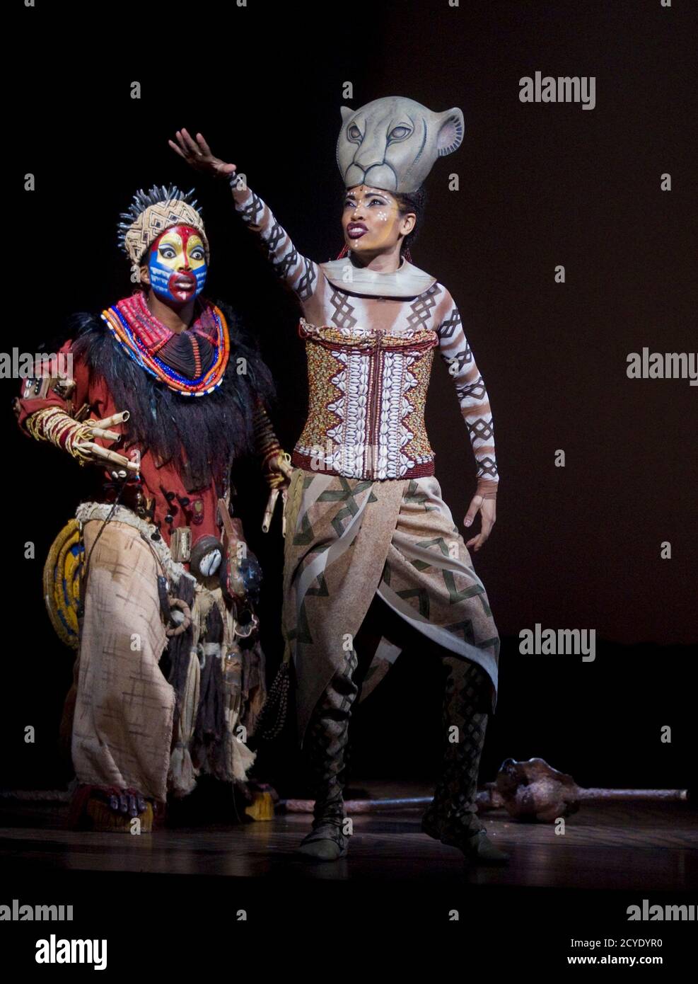 Actresses Daniela Pobega (R) dressed as "Nala" and Brenda Mhlongo dressed  as "Rafiki" perform during the press rehearsal of "El Rey Leon" ("The Lion  King") musical shows in Madrid October 13, 2011.