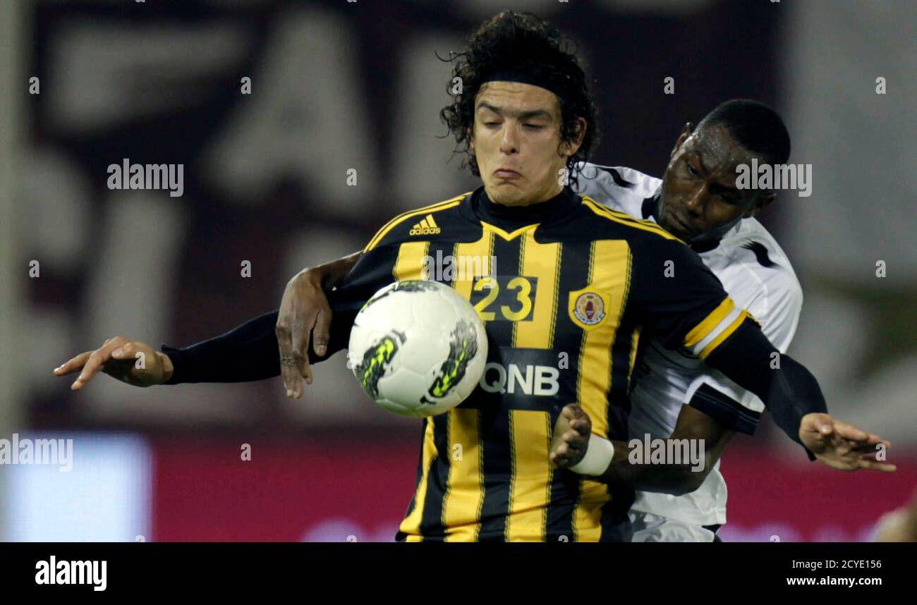 Al Sadd S Taher Zakria R Fights For The Ball With Qatar Sc S Sebastian Soria During Their Qatar Stars League Soccer Match In Doha March 17 12 Reuters Fadi Al Assaad Qatar s Sport Soccer Al Sadd S Taher Zakria R Fights For The Ball With Qatar Sc S Sebastian Soria During Their Qatar Stars League Soccer Match In Doha March 17 12 Reuters Fadi Al Assaad Qatar s Sport Soccer