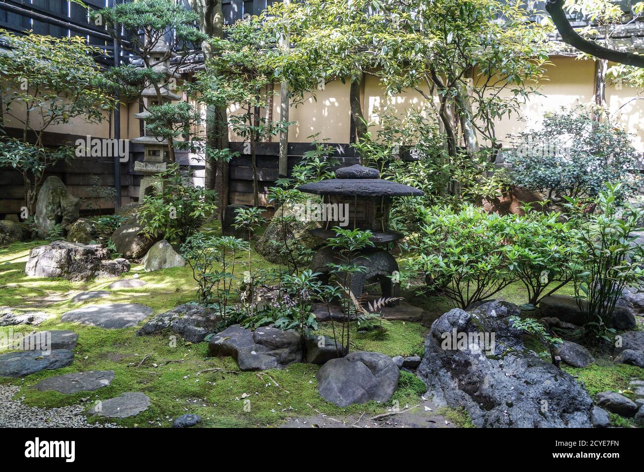 Traditional Japanese garden in a ryokan room in Kyoto, Japan Stock Photo