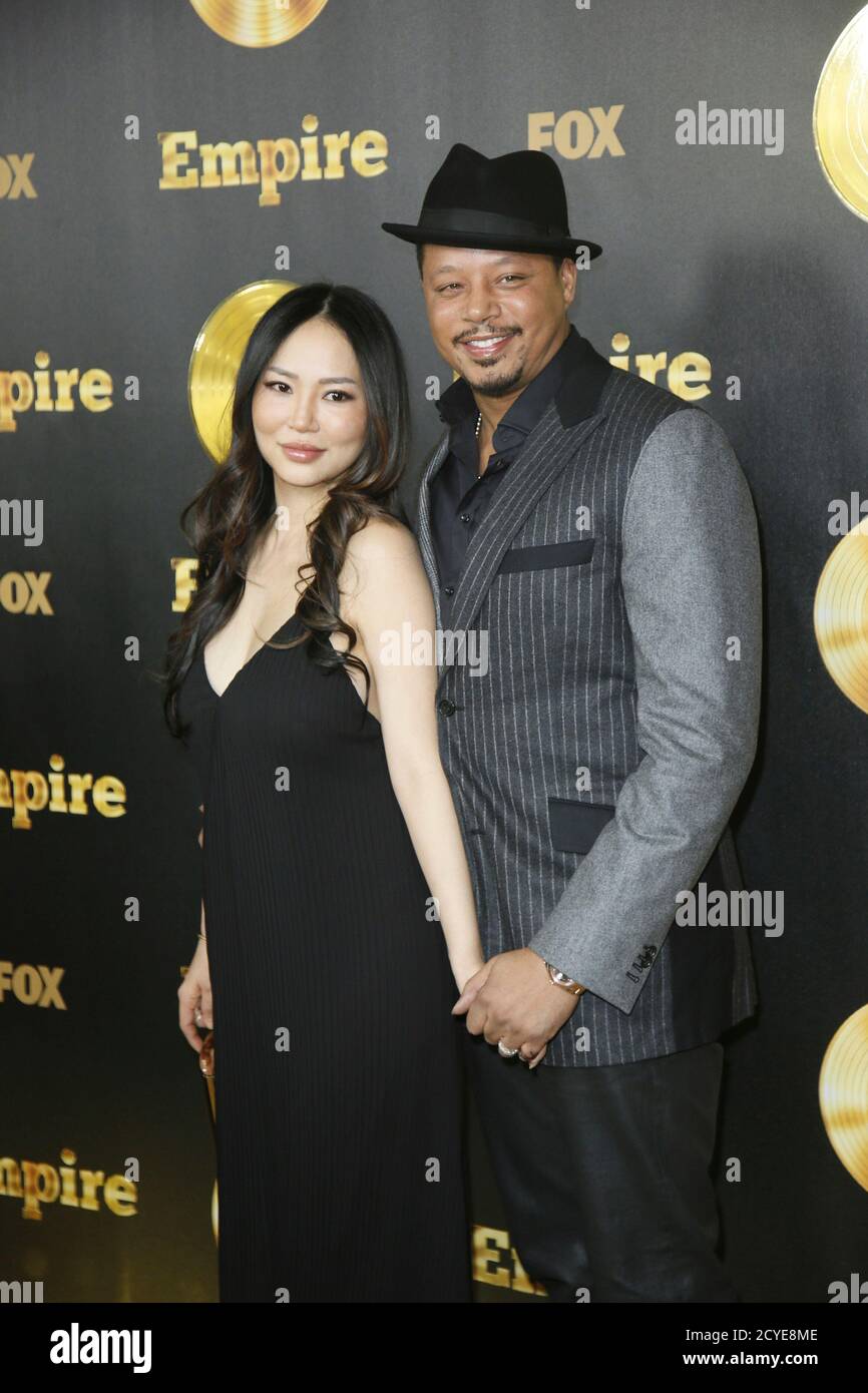 Actor Terrence Howard (R) and his wife Miranda pose at the 'Empire' premiere party in Hollywood, California January 6, 2015. REUTERS/Danny Moloshok (UNITED STATES - Tags: ENTERTAINMENT) Stock Photo