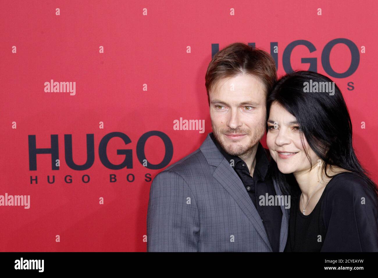 German actress Jasmin Tabatabei and her partner actor Andreas Pietschmann  arrive for the Hugo by Hugo Boss show at the Berlin Fashion Week  Autumn/Winter 2011 in Berlin, January 20, 2011. REUTERS/Tobias Schwarz (