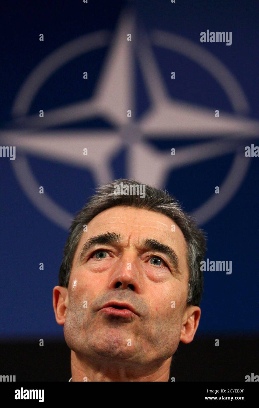 NATO Secretary General Anders Fogh Rasmussen holds a news conference during a NATO defence ministers meeting (NAC) at the Alliance headquarters in Brussels March 10, 2011. NATO defence ministers meeting in Brussels on Thursday and Friday will discuss options to respond to the turmoil in Libya, including a possible no-fly zone, the officials said.      REUTERS/Yves Herman (BELGIUM - Tags: POLITICS CIVIL UNREST MILITARY IMAGES OF THE DAY) Stock Photo