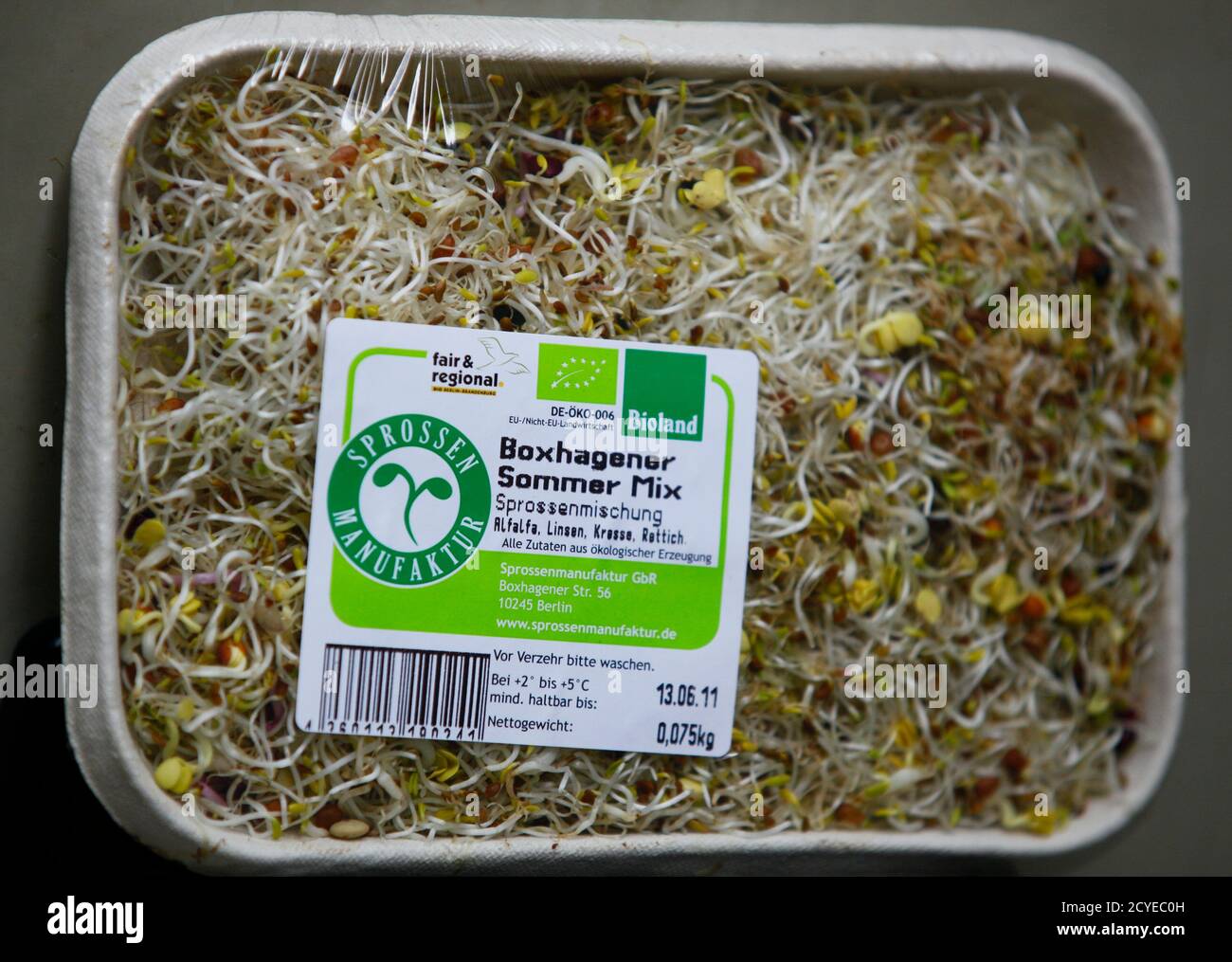 A mixture of ready-packed bean and salad sprouts are pictured at Berlin's sprouts manufacturer 'Sprossenmanufaktur' in Berlin June 6, 2011. The managing director of a German organic farm near Hanover that might be at the centre of a deadly E.coli outbreak said on Monday he was baffled that his beansprouts are suspected of causing such devastation. German officials said on Sunday the beansprouts of Klaus Verbeck, the head of the 'Gaertnerhof Bienenbuettel', could be the source of the EHEC bacteria (enterohaemorrhagic Escherichia coli) outbreak that has killed 22 and made more than 2,200 people  Stock Photo