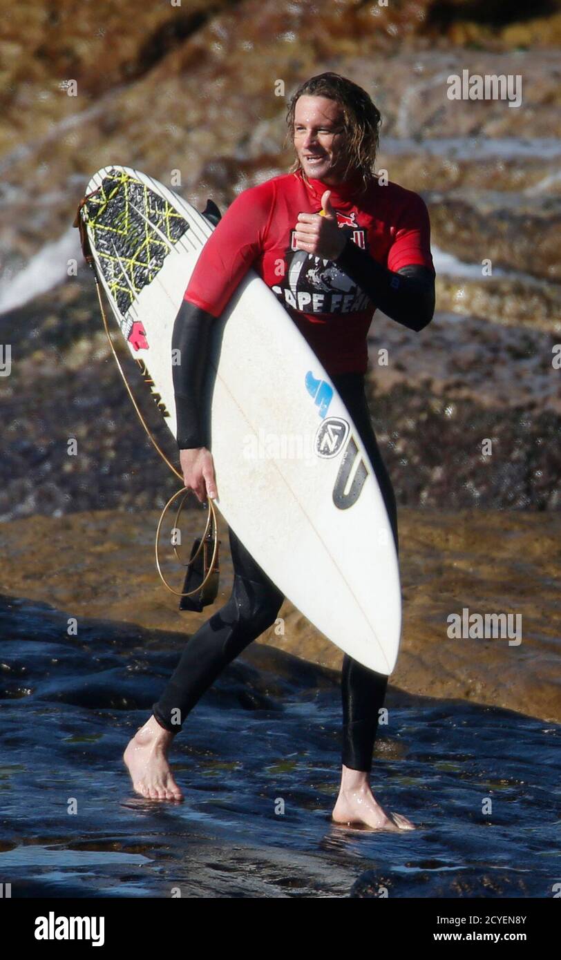 Australia S Laurie Towner Gives A Thumbs Up After Defeating New Zealand S Dave Rastovich At The Inaugural Red Bull Cape Fear Invitational Surfing Tournament Off The Shores Of Southern Sydney August 31 14 Reuters Jason