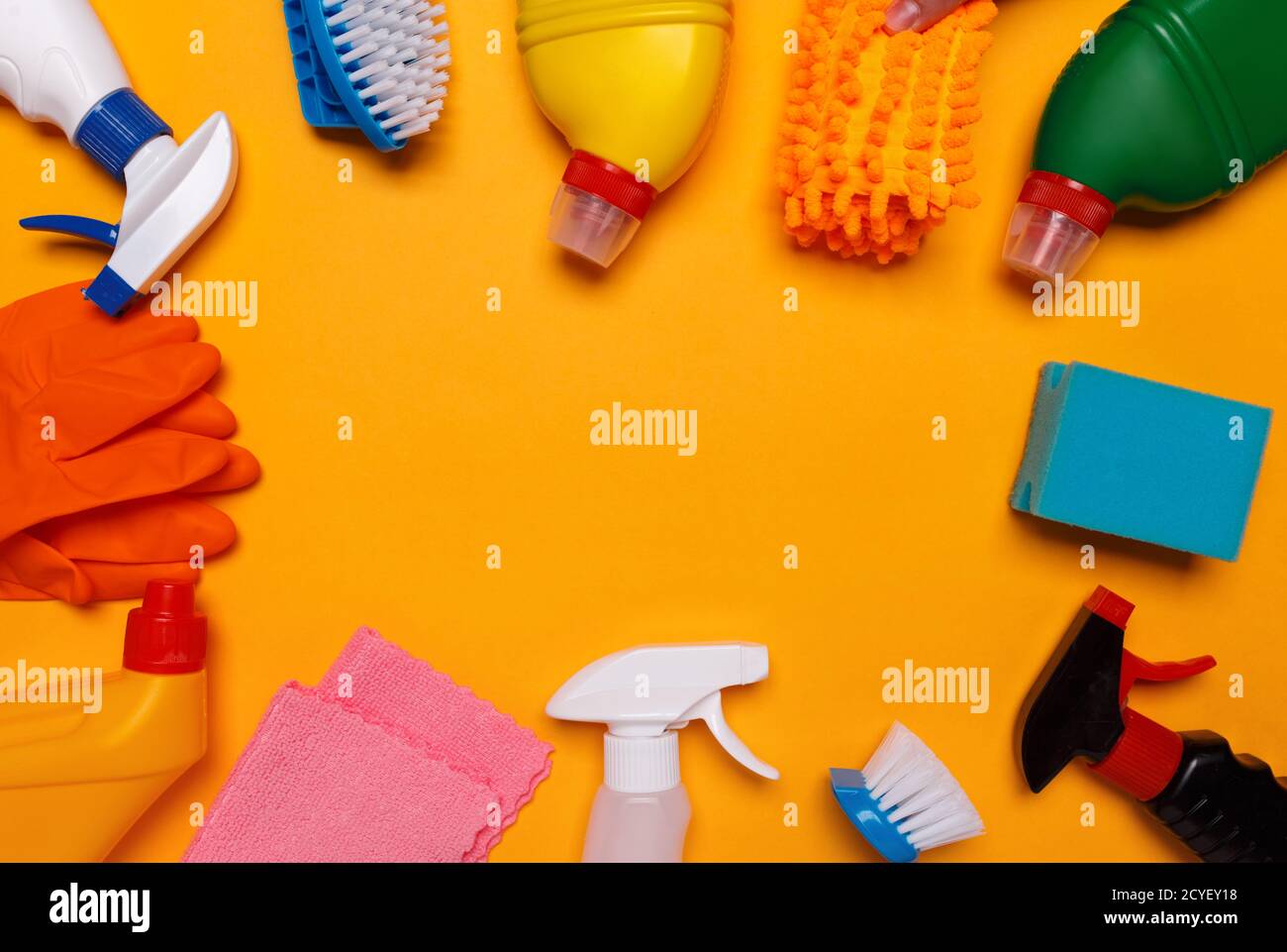 means for cleaning the house on a yellow background. place for text