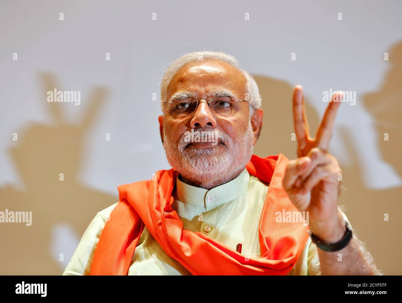 Hindu Nationalist Narendra Modi, The Prime Ministerial Candidate For India's  Main Opposition Bharatiya Janata Party (Bjp), Gestures Upon His Arrival To  Meet His Party Leaders And Workers At Gandhinagar In The Western