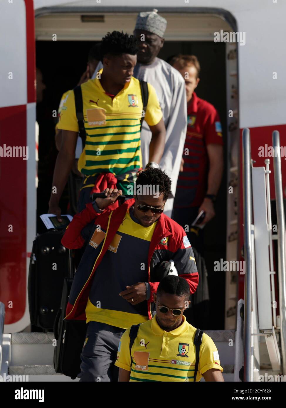 Cameroon S National Soccer Team Players Samuel Eto O Bottom Alexandre Song C And Nicolas Nkoulou Top Are Pictured During Their Arrival In Galeao Aerial Base Ahead Of The 14 World Cup In Rio