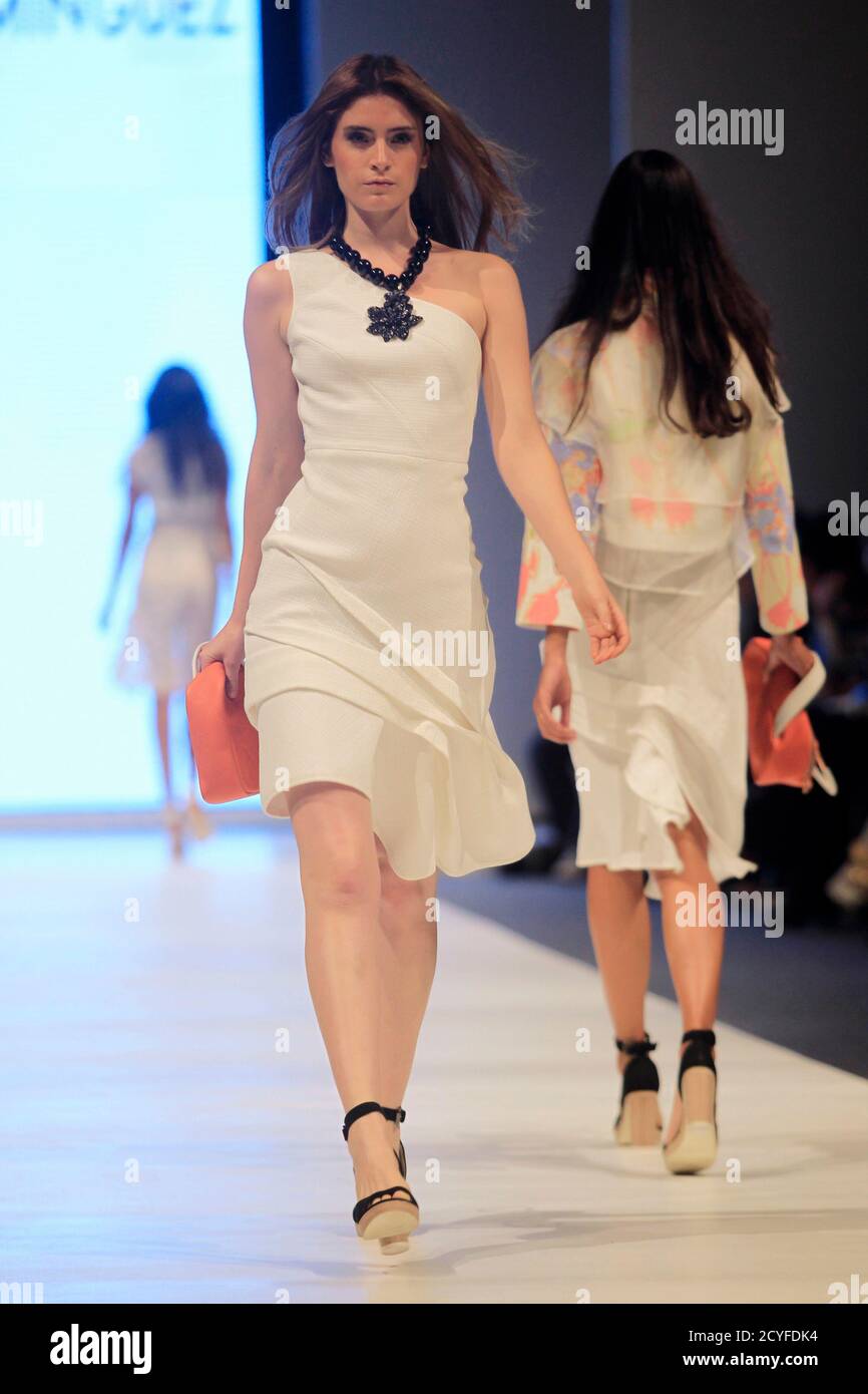 A model presents a creation by Spanish designer Adolfo Dominguez during the  Peru Moda 2012 fashion week show in Lima April 23, 2012. REUTERS/Pilar  Olivares (PERU - Tags: ENTERTAINMENT Stock Photo - Alamy