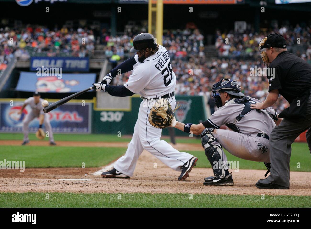 Detroit Tigers' Prince Fielder pops out to New York Yankees' Eric Chavez  during the fourth inning of their MLB American League baseball game in Detroit,  Michigan August 9, 2012.  REUTERS/Rebecca Cook  (UNITED STATES - Tags: SPORT BASEBALL) Stock Photo