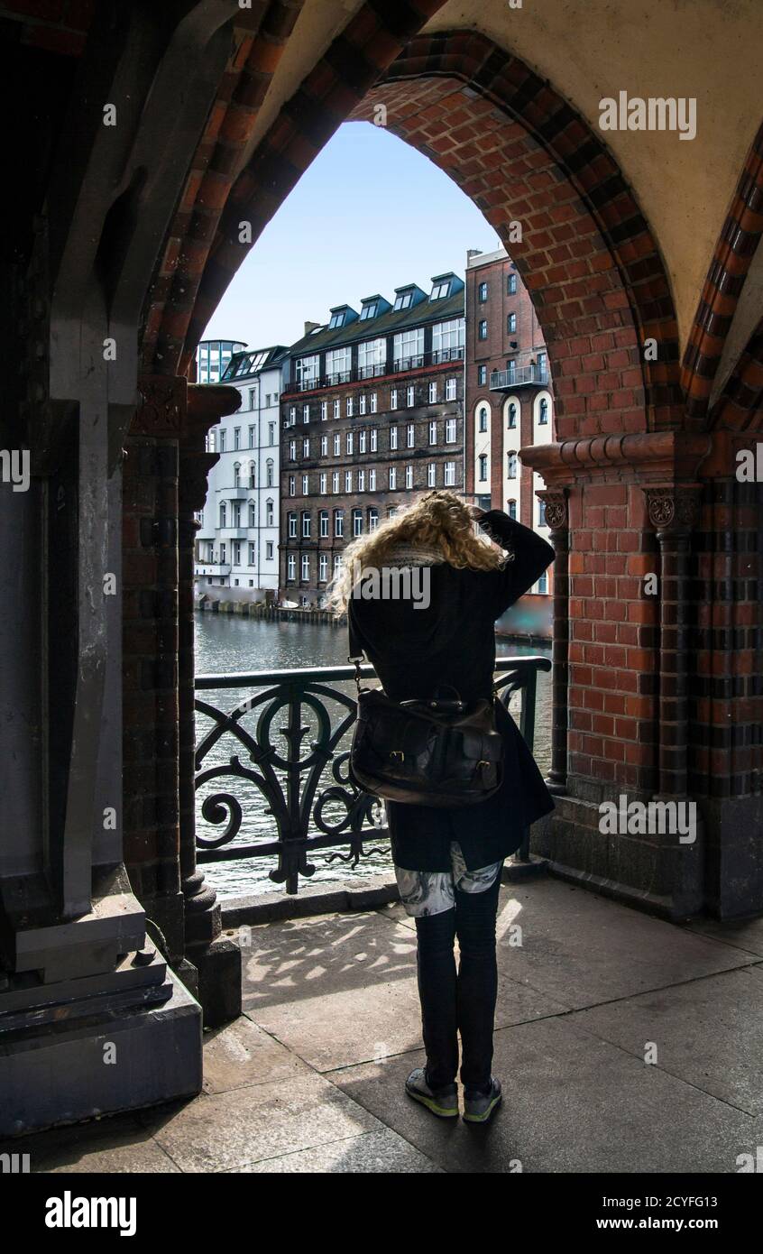 The Oberbaum Bridge next to Berlin wall and the view from the bridge, Germany Stock Photo