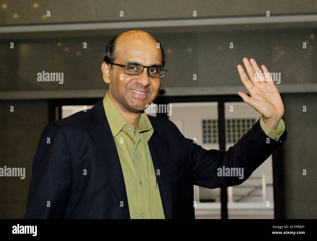 Singapore S Finance Minister Tharman Shanmugaratnam Waves As He Arrives To Present The Budget At Parliament In Singapore February 18 2011 Singapore Expects A Small Overall Budget Deficit Of S 300 Million 235 Million Uma karuna thurman (born april 29, 1970) is an american actress, writer, producer and model. alamy