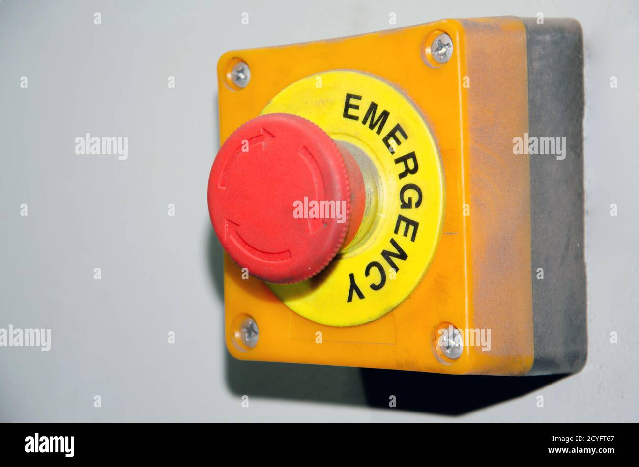 mushroom Observe tennis Big Red emergency button or stop button for manual pressing. STOP button  for industrial equipment, emergency stop. Red light. At the factory and  Stock Photo - Alamy