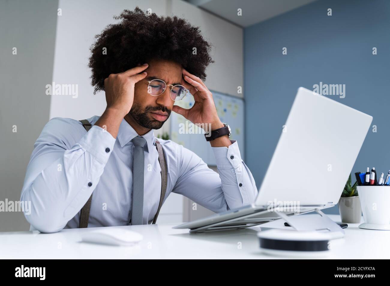 African Business Man Upset And Worry Or Bored Or Stressed Stock Photo