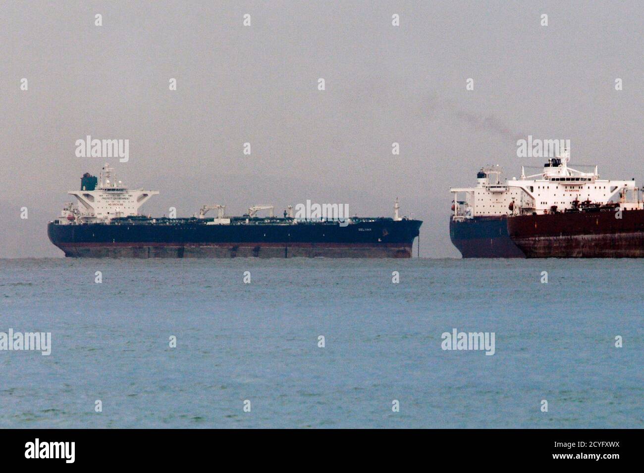 Vessels Sail Past Malta Flagged Iranian Crude Oil Supertanker Delvar L Anchoring Off Singapore March 1 A mistake on the part of an interviewer, or the anchor. https www alamy com vessels sail past malta flagged iranian crude oil supertanker delvar l anchoring off singapore march 1 2012 western trade sanctions against iran are strangling its oil exports even before they go into effect a us advisory body has found amid warnings that any shortages will only push up crude prices and strain a weak global economy reuterstim chong singapore tags energy business maritime transport image378363830 html