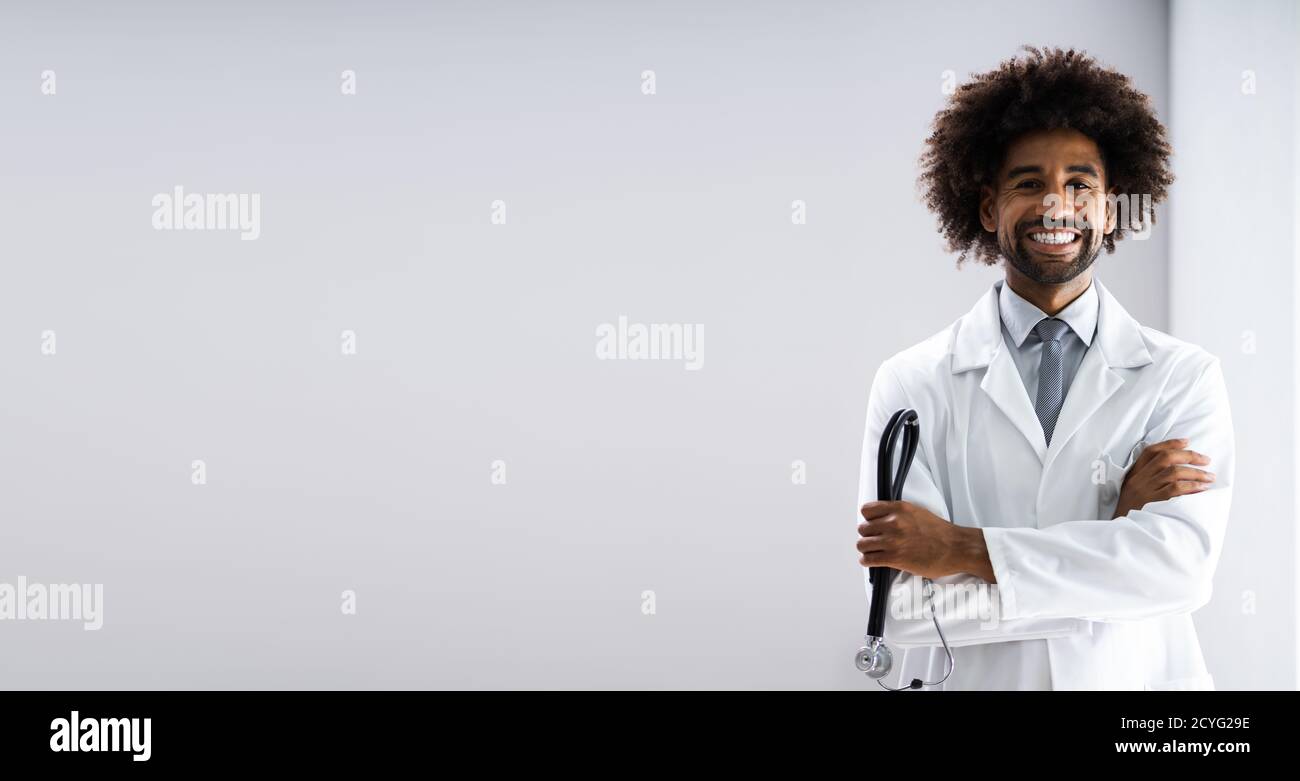 African American Doctor With Stethoscope At Healthcare Lab Stock Photo