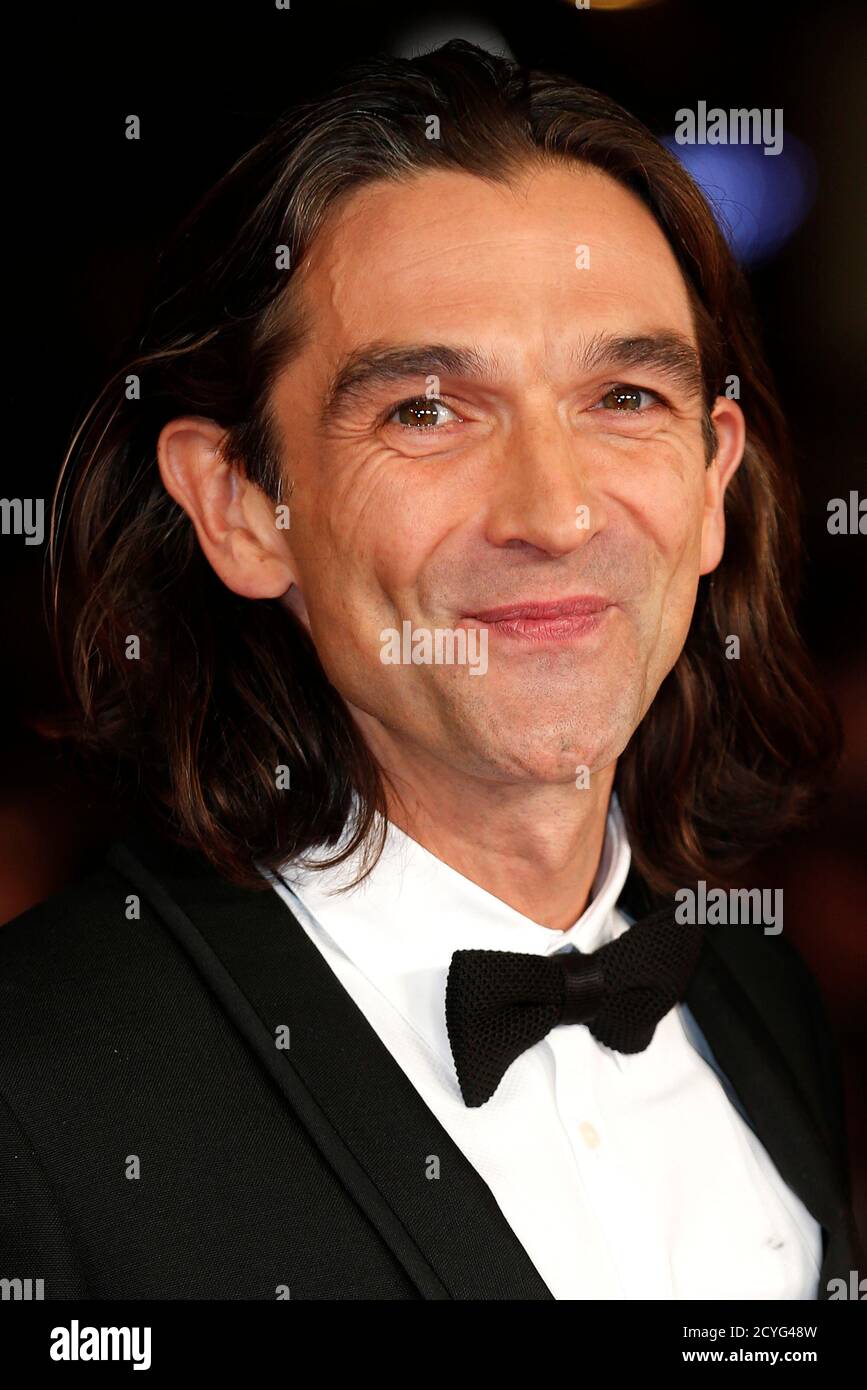 Director Justin Chadwick arrives for the Royal Premiere of 'Mandela: Long Walk to Freedom' in London December 5, 2013. REUTERS/Suzanne Plunkett (BRITAIN - Tags: ENTERTAINMENT HEADSHOT) Stock Photo
