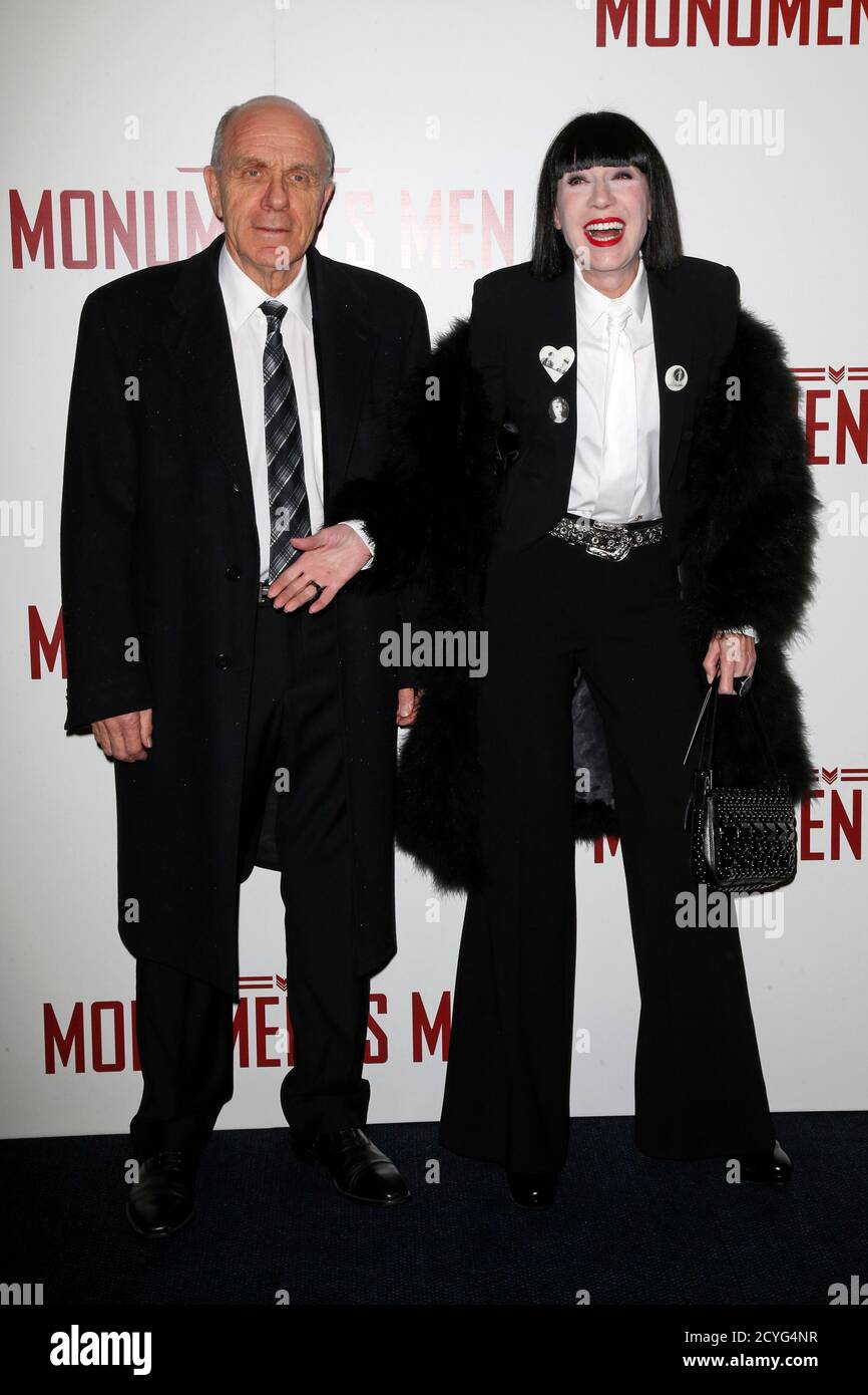 French fashion designer Chantal Thomass and her husband Michel Fabian  arrives for the French premiere of the film "The Monuments Men" in Paris  February 12, 2014. REUTERS/Benoit Tessier (FRANCE - Tags: ENTERTAINMENT
