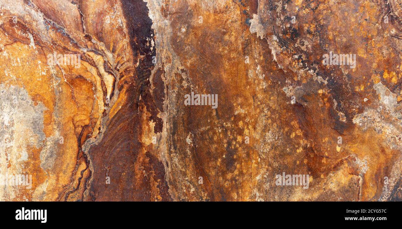 Brown orange slate stone slab in panoramic closeup Stock Photo