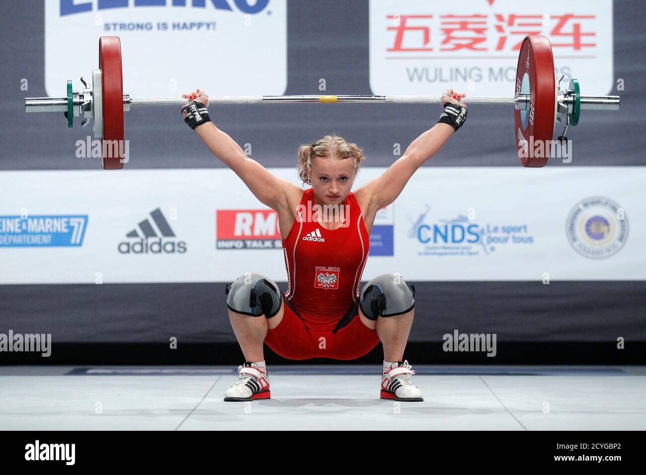 Marzena Karpinska of Poland competes in the Women 48kg weightlifting  competition during the World Weightlifting Championships at Disney Village  in Marne-la-Vallee, outside Paris November 5, 2011. REUTERS/Benoit Tessier  (FRANCE - Tags: SPORT