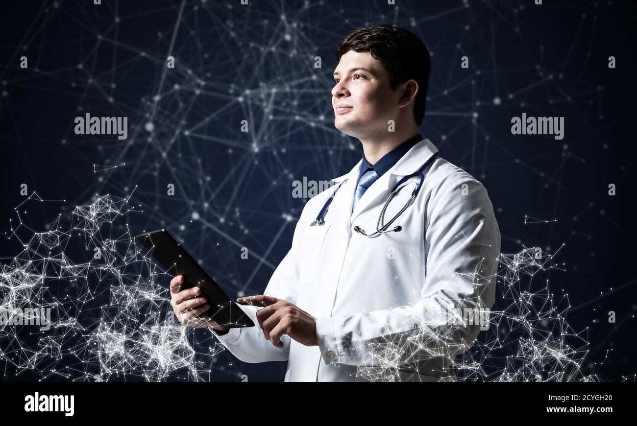Doctor with tablet. Concept of digital healthcare Stock Photo