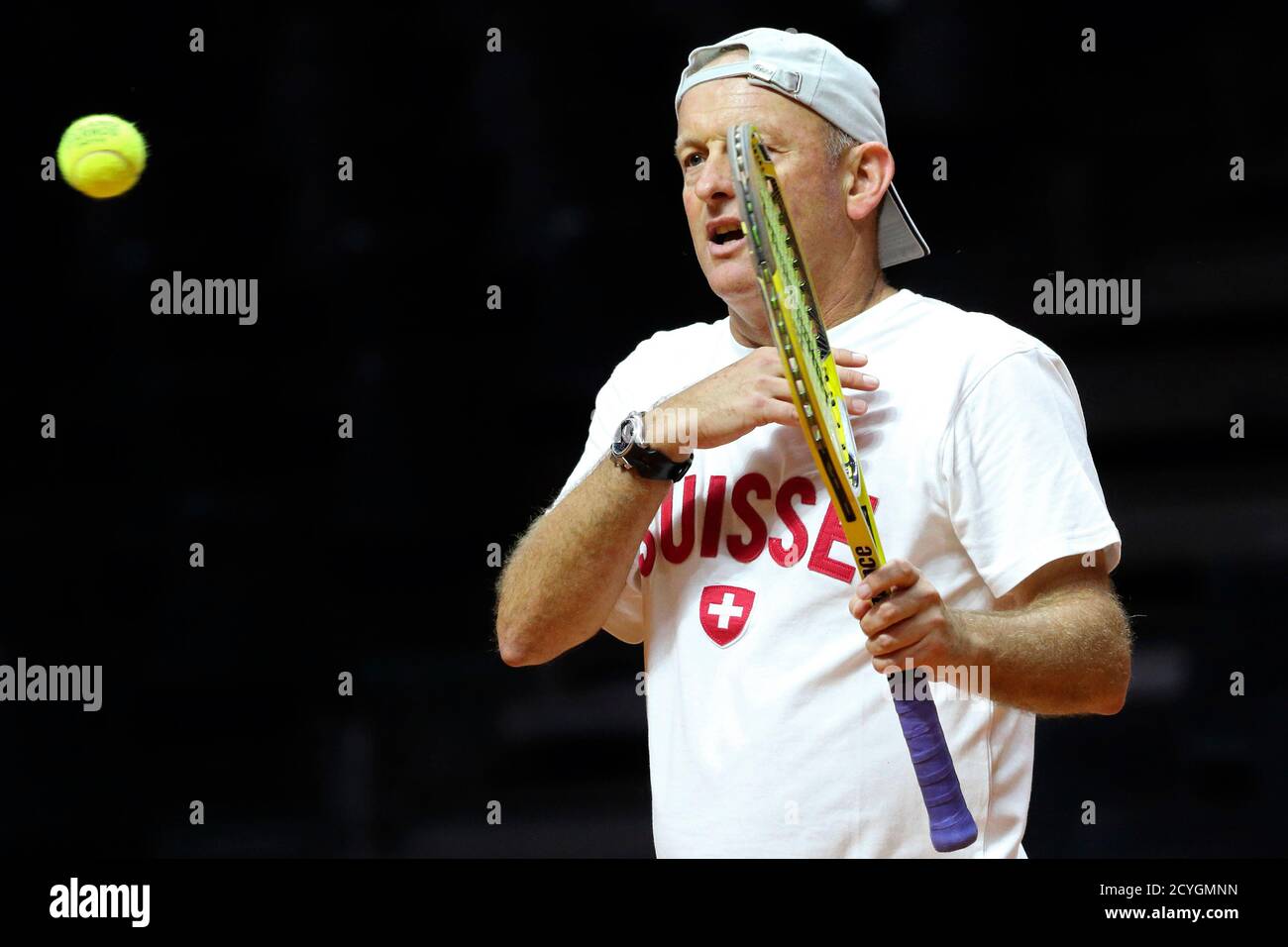 David McPherson coaches Switzerland's Davis Cup tennis team during a  training session at the Pierre Mauroy stadium in Villeneuve d'Ascq,  northern France, November 19, 2014. France will face Switzerland in their  Davis