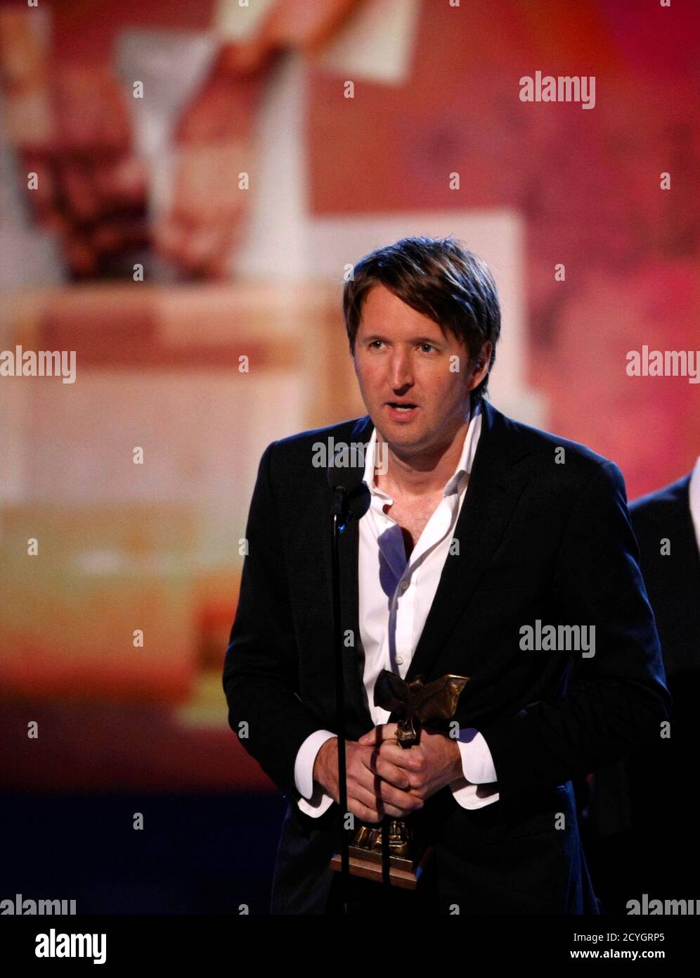 British director Tom Hooper accepts the best foreign film award for 'The King's Speech' during the 2011 Film Independent Spirit Awards in Santa Monica, California February 26, 2011. REUTERS/Rick Wilking (UNITED STATES - Tags: ENTERTAINMENT) Stock Photo