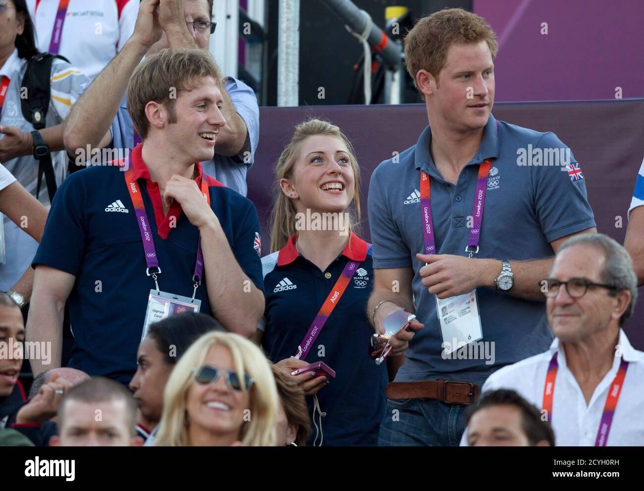 Britain S Prince Harry And Gold Medal Winning Cyclists Laura Trott And Jason Kenny Watch The Women S Beach Volleyball Bronze Medal Match Between Brazil And China At Horse Guards Parade During The London 2012