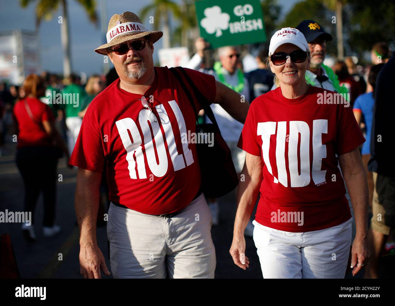 Alabama Crimson Tide fans wear Roll Tide shirts outside Sun Life stadium  before the BCS National Championship college football game between Alabama  and the Notre Dame Fighting Irish in Miami, Florida January