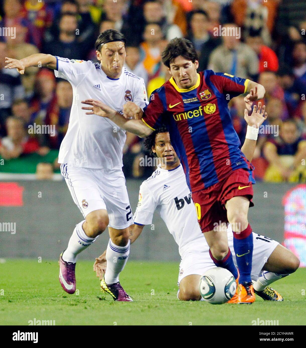 Real Madrid S Mezut Ozil L And Marcelo Challenge Barcelona S Lionel Messi R During Their King S Cup Final Soccer Match At Mestalla Stadium In Valencia April 11 Reuters Heino Kalis Spain s