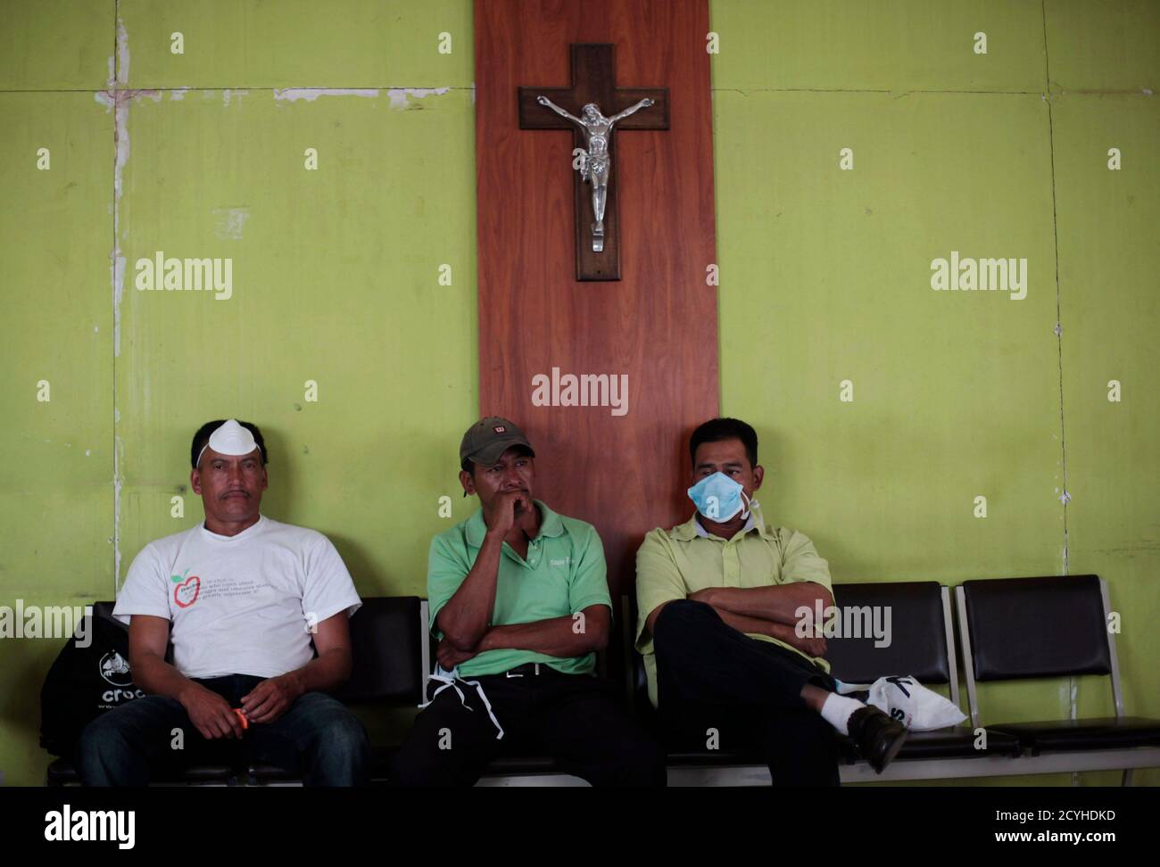 Juan Antonio Flores (L) waits for the body of his 29-year-old son Adalid Flores, who died in the February 14 Comayagua prison blaze, at the morgue in Tegucigalpa, February 19, 2012. Honduras Juan Antonio Flores (L) waits for the body of his 29-year-old son Adalid Flores, who died in the February 14 Comayagua prison blaze, at the morgue in Tegucigalpa, February 19, 2012. Honduras